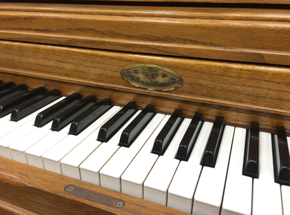 compare used piano to yamaha kawai